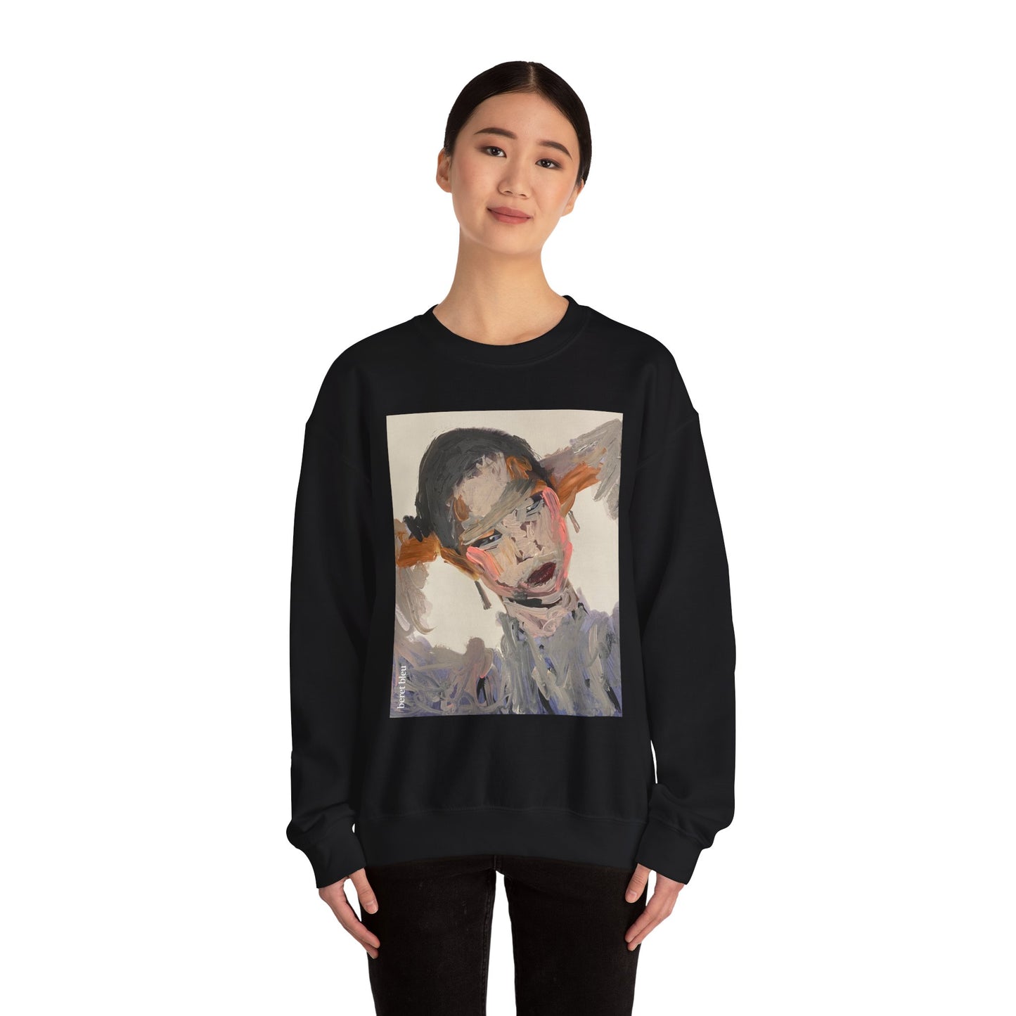 Black sweatshirt with a graphic design of a woman's face on a white background