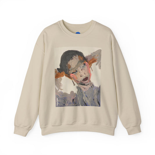 Beige sweatshirt with a graphic of a stylized face on a white background