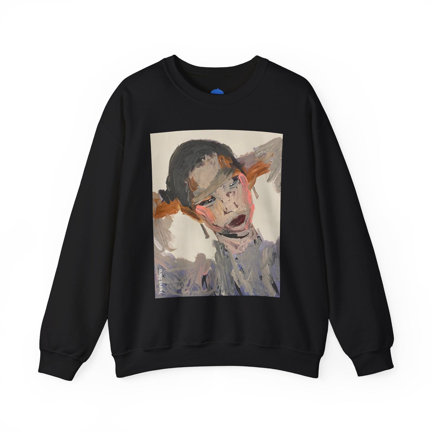 Black sweatshirt with a graphic of a stylized face on a white background