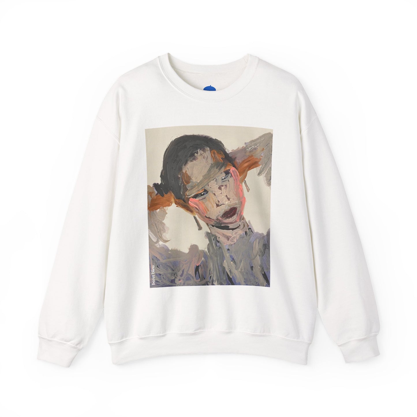White sweatshirt with a graphic of a stylized face on a white background